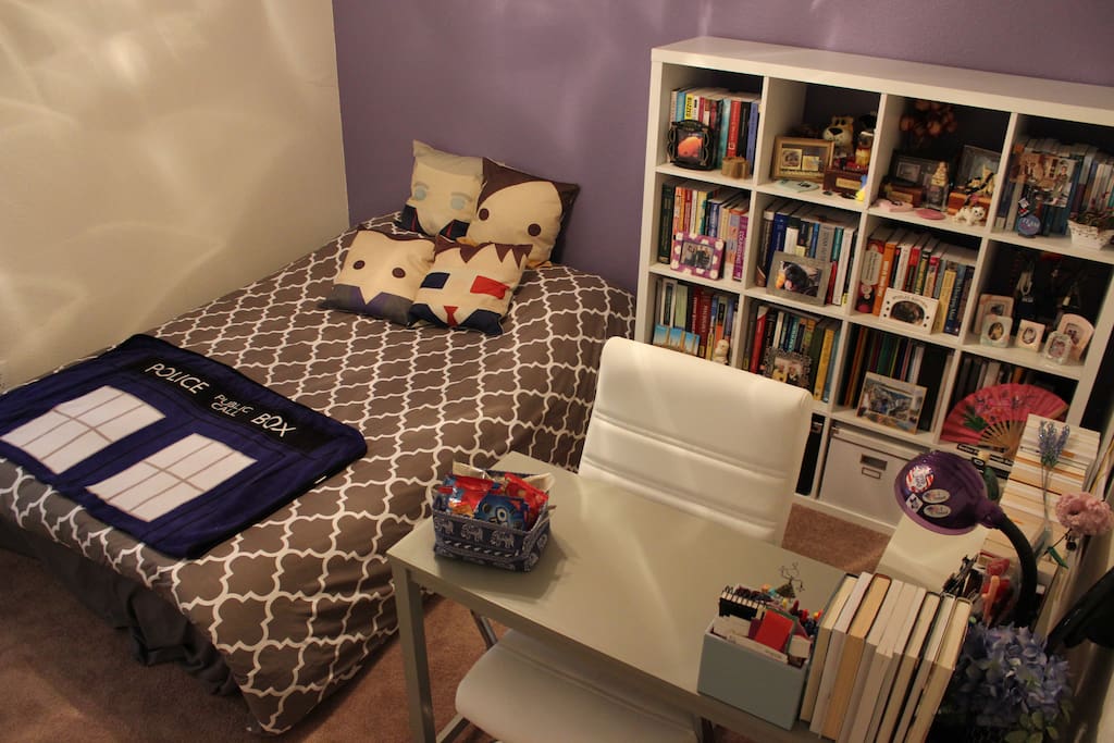 This is where you get to stay. Fancy aerial view (me standing on a step-stool) from the doorway of the guest room/office. Lots of books and Doctor Who pillows! If you're not a Whovian, I won't judge you. (Too much.)