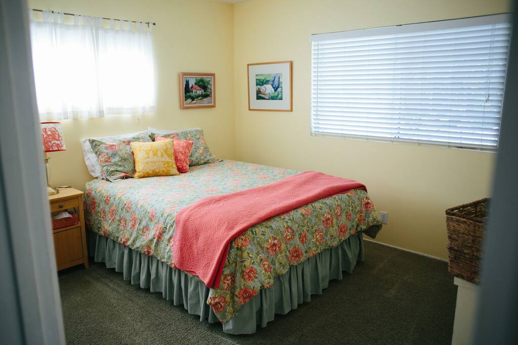 ground floor "sunshine" room with mirrored closet doors and dresser drawers. lots of light.
