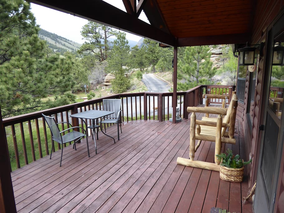 Front porch with great forest and rock outcropping views. Relaxing seating to enjoy