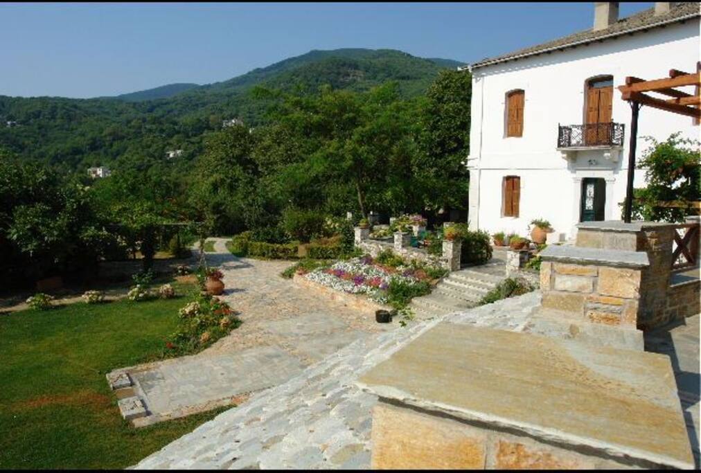 View of the grass lawn garden from Guesthouse III