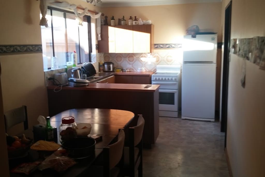 Share kitchen and dining. All kitchen ware provided, including fridge space.