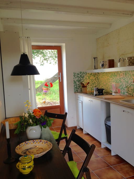 Kitchen with door to the terrase