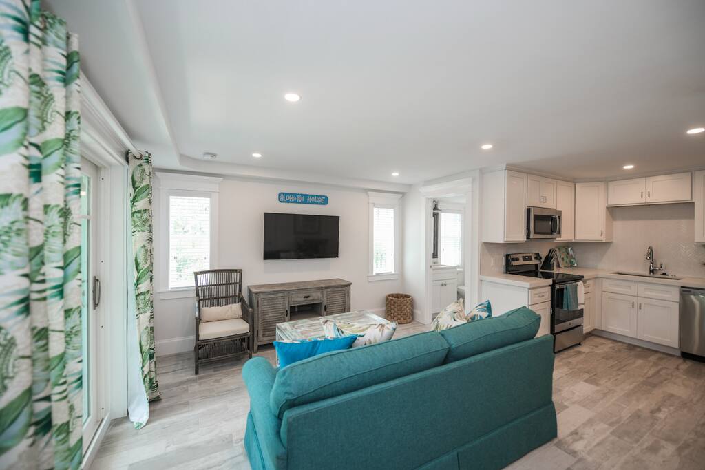 Open floor plan with balcony access