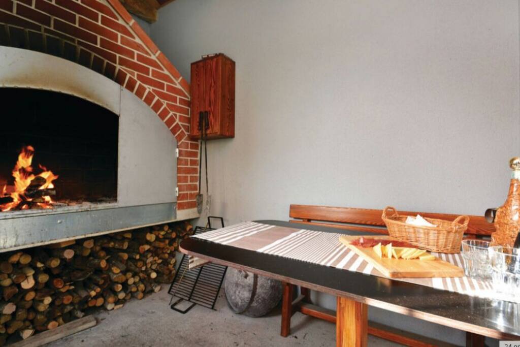 House for known Dalmatian peka made on wood fire under the bell