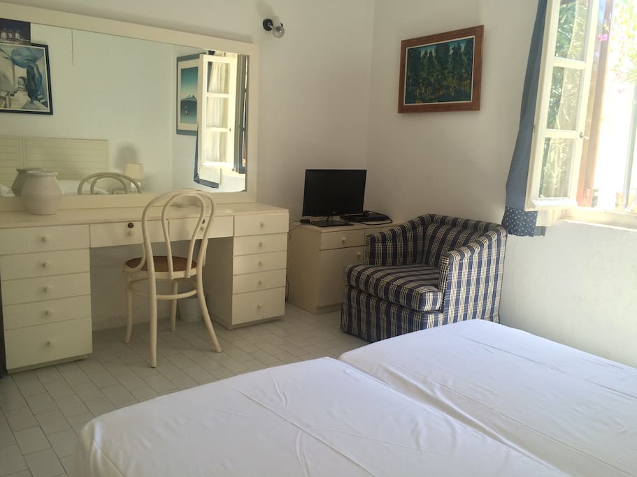 1st Bedroom with 2 single beds and office with mirror
