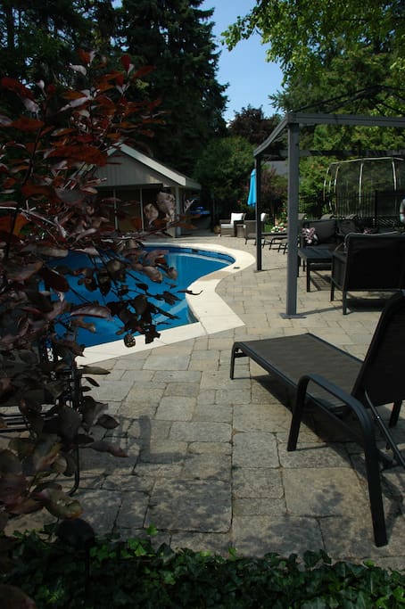 Inground pool with pool house complete with a 2 piece bathroom