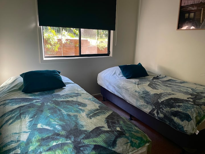 Dormitorio dos camas tamaño king individuales 