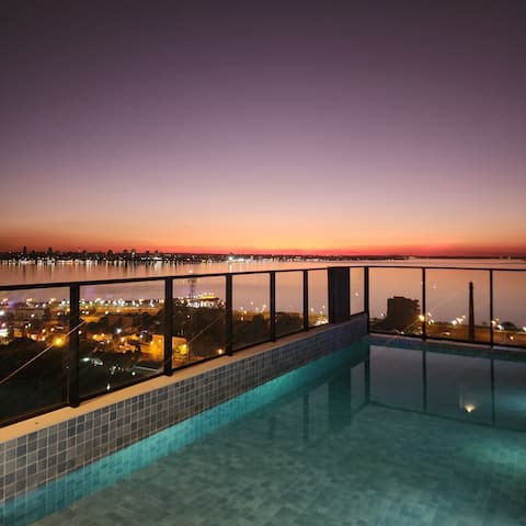 Apartment. centrally located with river views, pool and garage