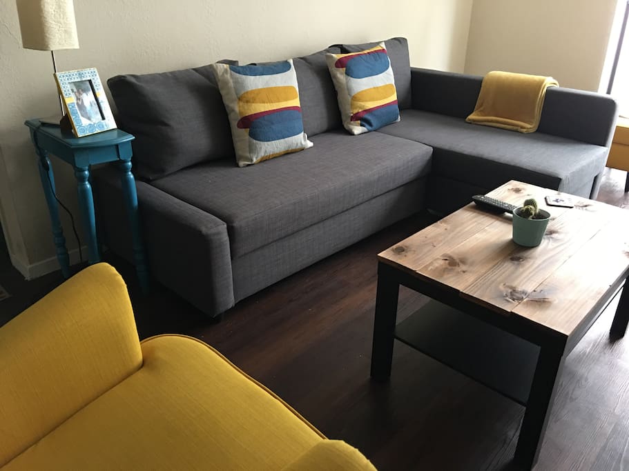 Pull-out couch in the living room, sleeps 2.