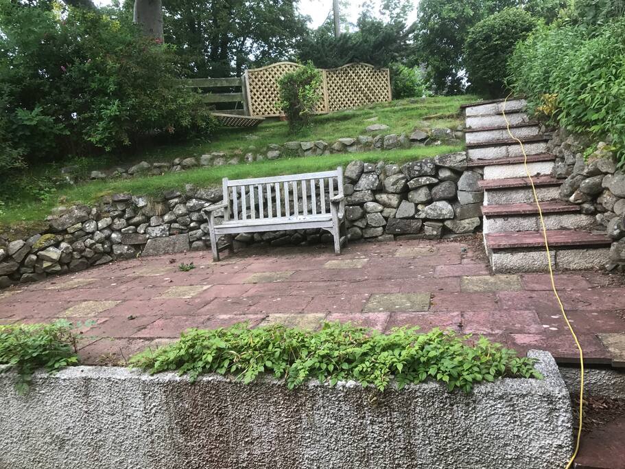 Steps to 3 tier garden. Hot tub is top tier on right