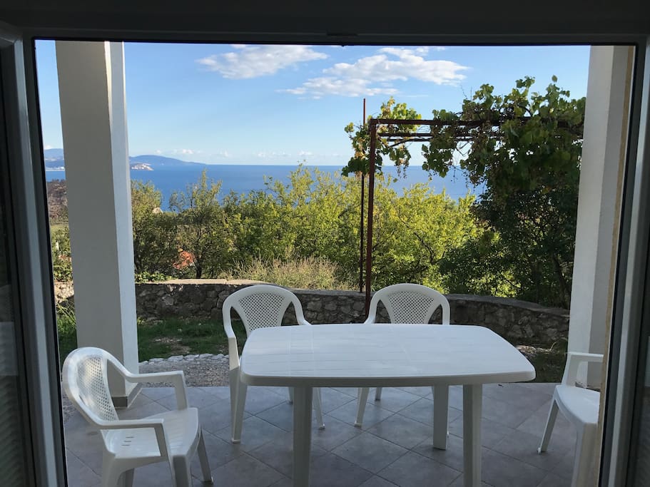 Double doors open onto the garden terrace with stunning views. Ideal for al fresco dining.