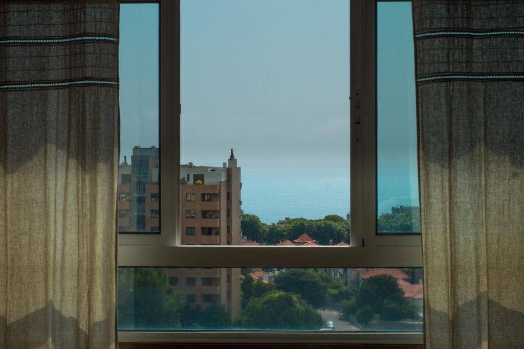 Living room view with the sea on the horizon
