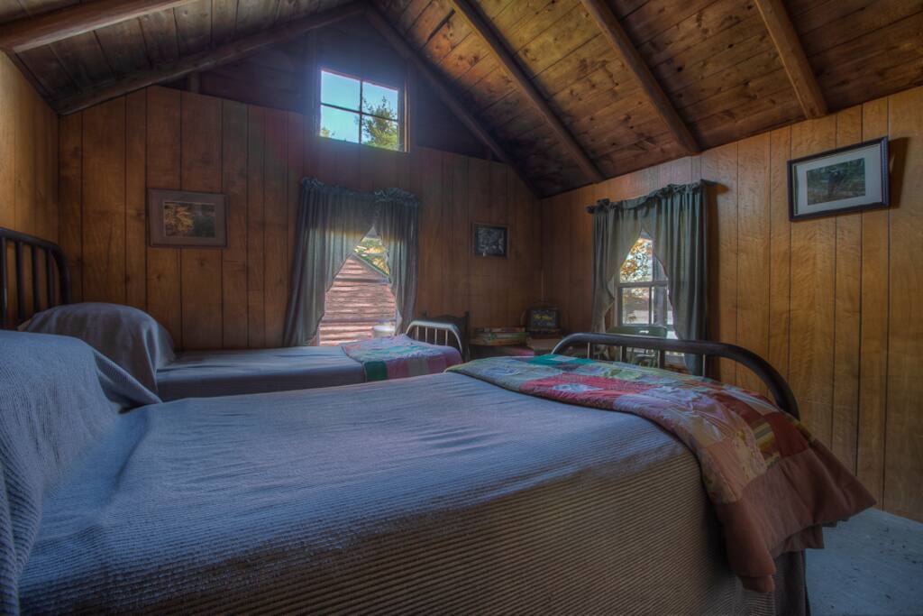 2nd bedroom with two twins, and a single cot