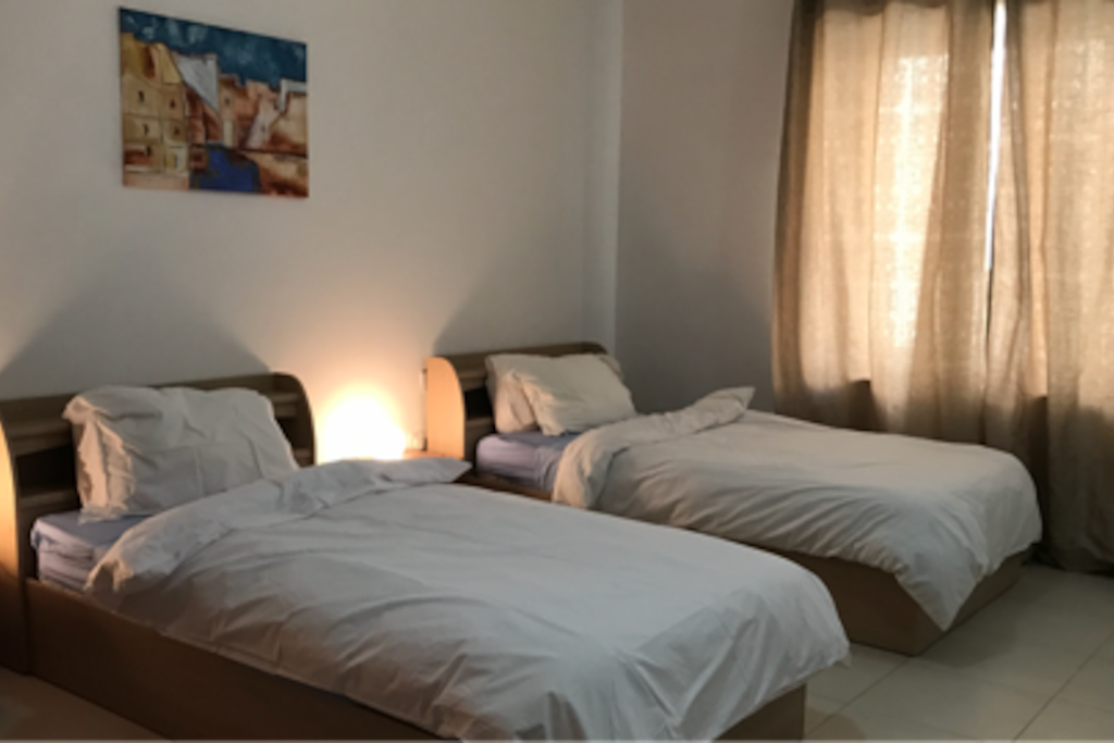 1st bedroom with 2 1 and half size beds
