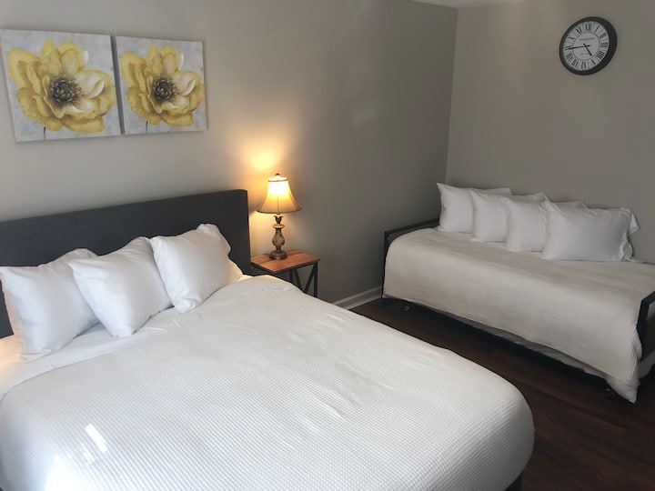 This room with a queen and twin sized daybed with trundle is perfect for families traveling with younger children they want to keep close by! 