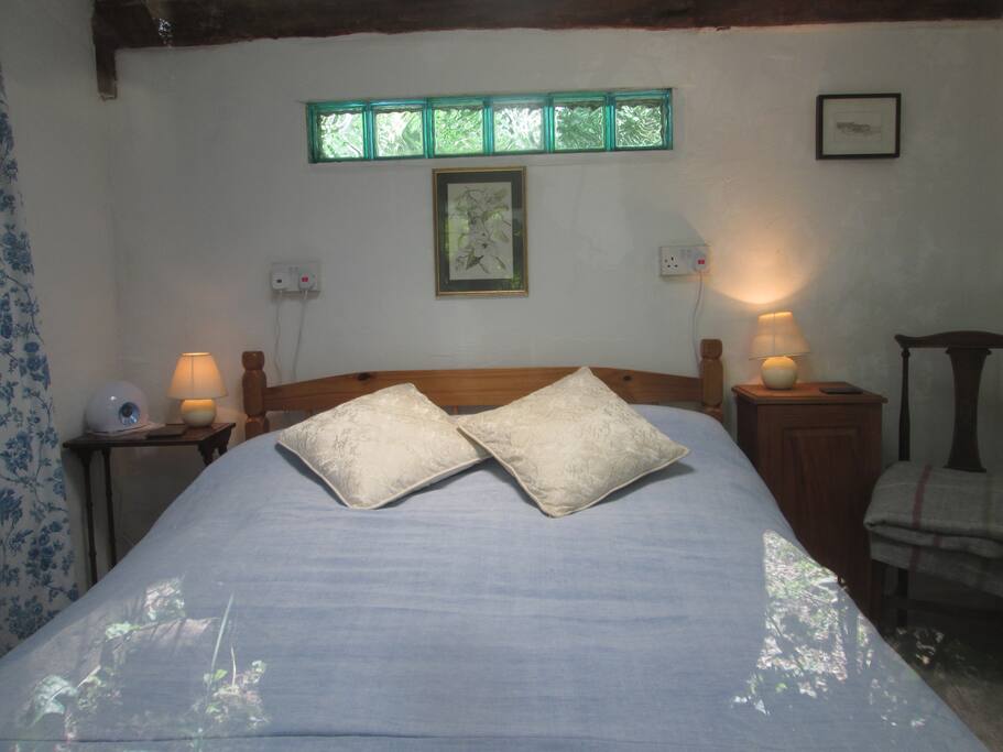 The annexe bedroom through the window