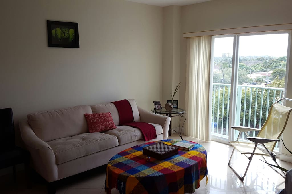 Guest sofa bed, livingroom and balcony view.