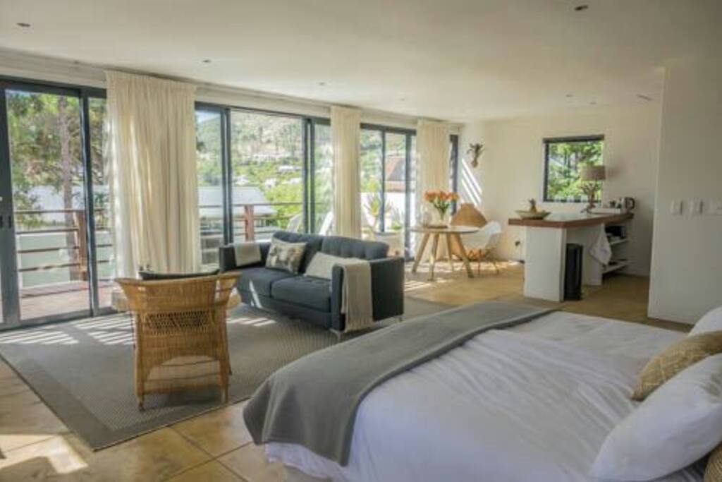 View from bed area with big sliding doors to the balcony.