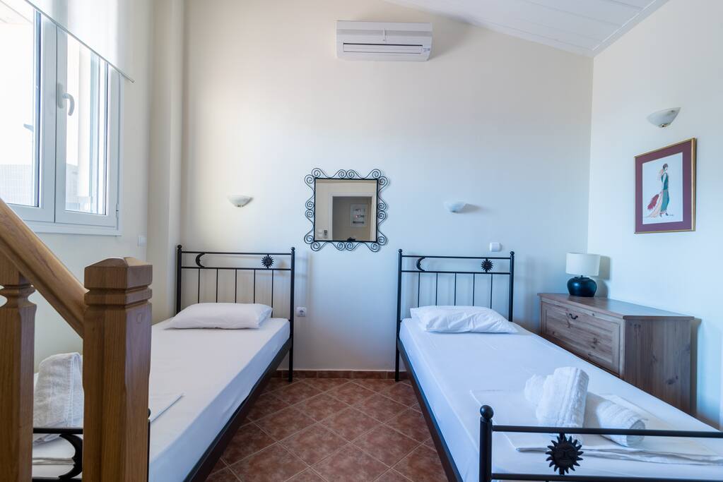 Bedroom with two beds, we could put together or same as the picture