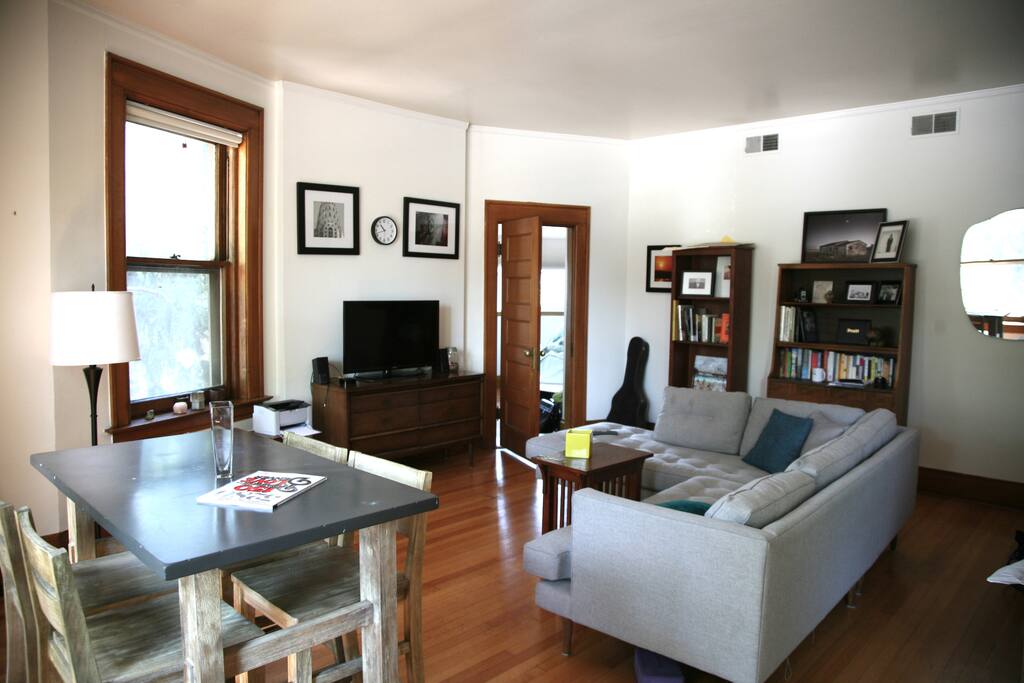 Midcentury modern furnishings and art work well to create a quiet refuge in the city