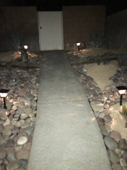 Private entrance, lit at night