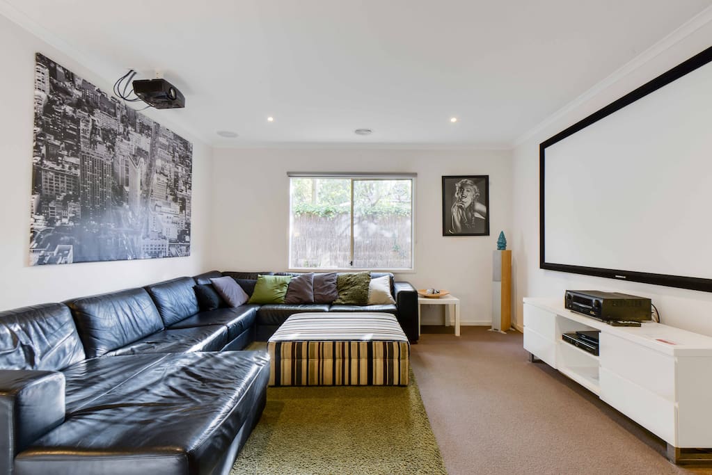 Large home cinema with surround sound, Foxtel movies and sports & dvd's