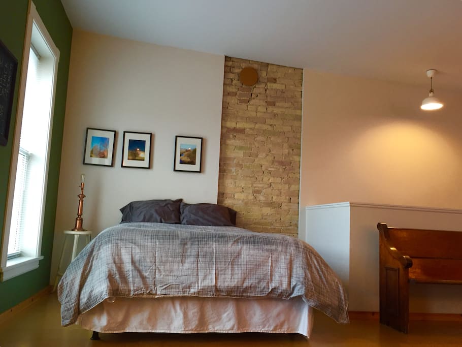 Queen size bed, across from sitting area