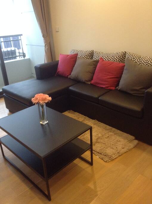Relax on sofa with cushion.