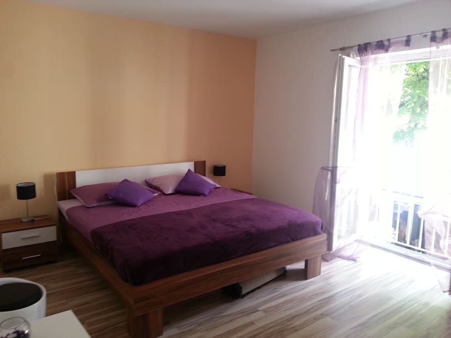 1st bedroom in full purple setting
