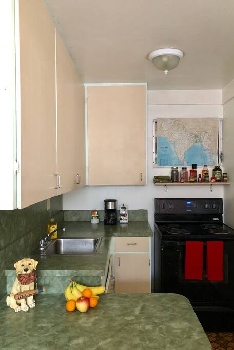Fully stocked kitchen with stove and refrigerator for your use.