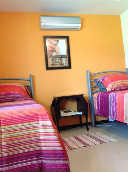 2 single beds in the 2nd bedroom