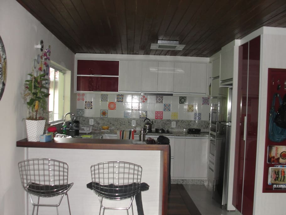 Cozinha integrada com sala jantar