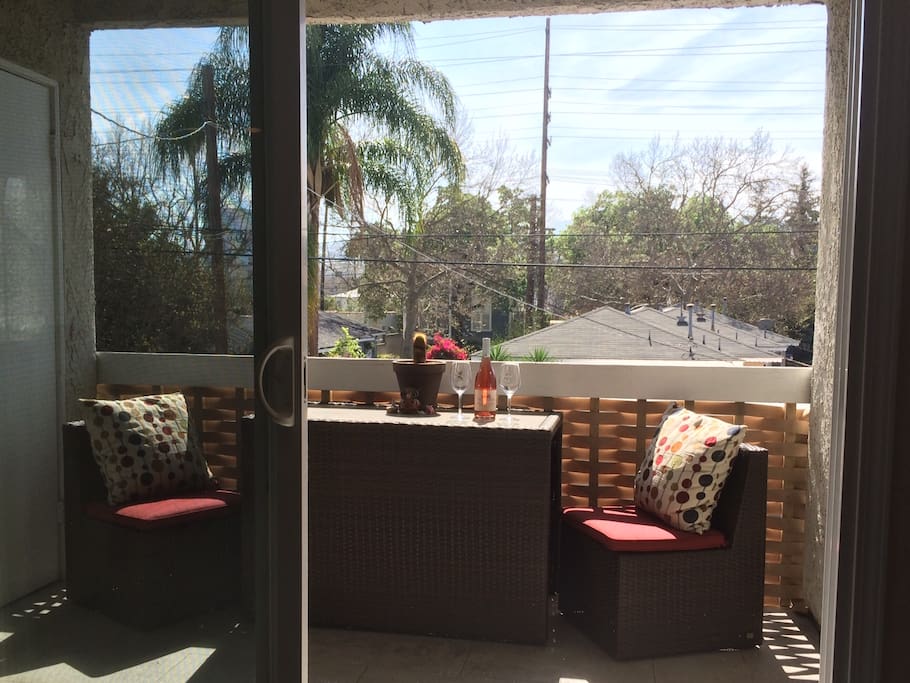 Enjoy breakfast on our balcony with a pleasant view of the Hollywood Hills.