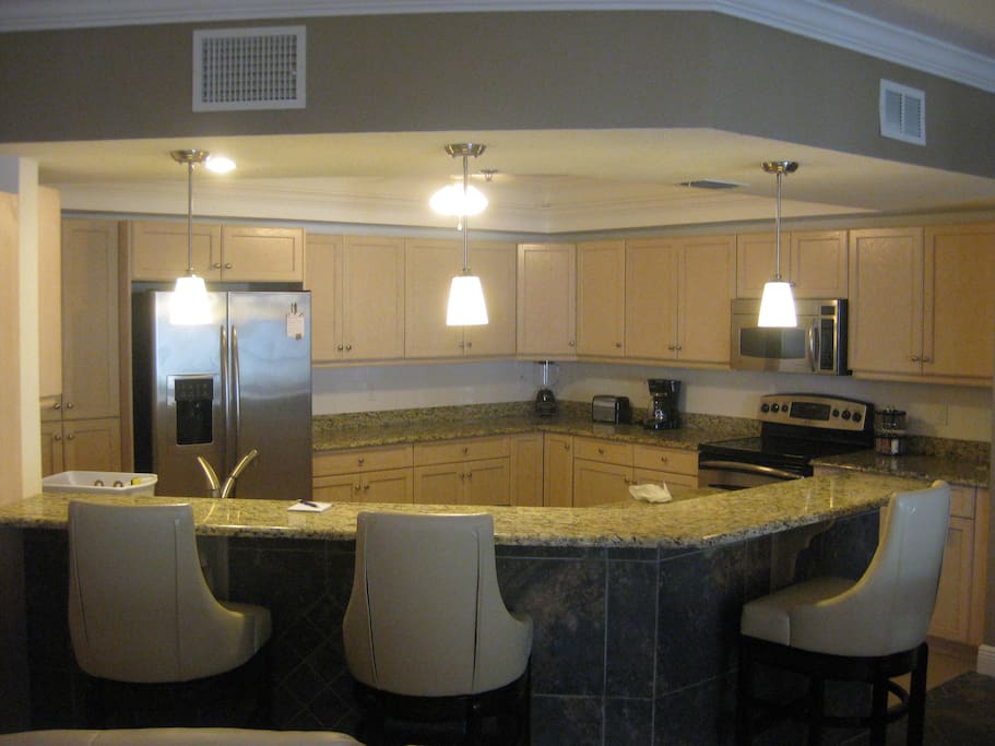Fully equipped kitchen/breakfast bar with all essentials for a comfortable stay