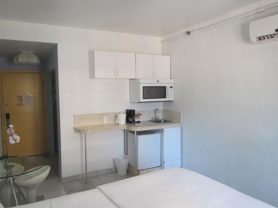 Small refrigerator, microwave, coffee maker