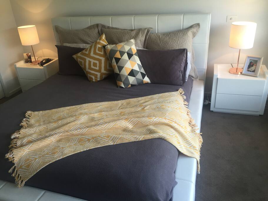 Master bedroom features a king size bed