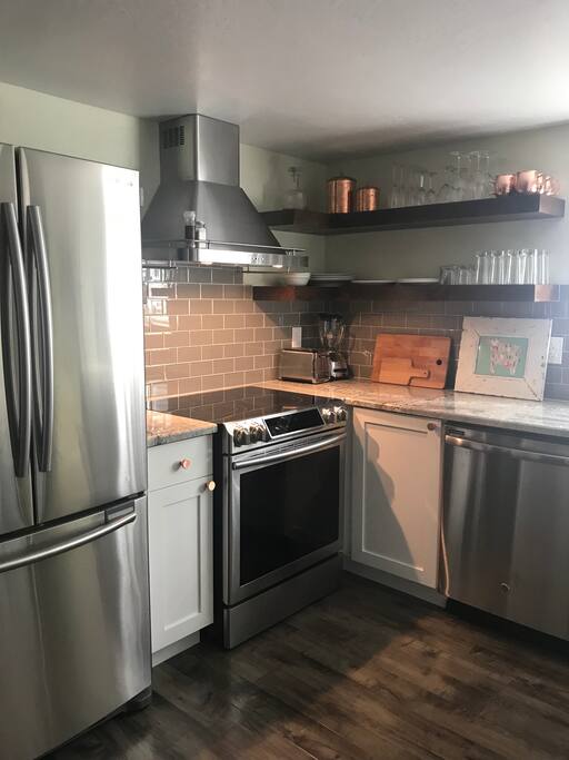 Modern updated kitchen. Fully stocked with everything you’d need to cook a great meal.