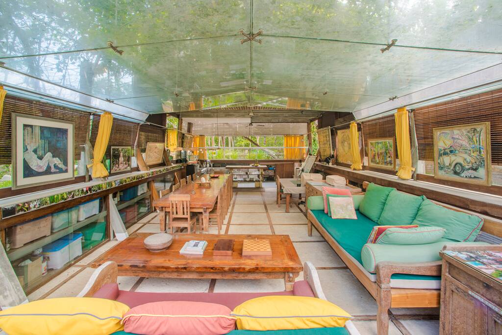 Glass ceiling above living room by the pool, canopy of passiflore & other seasonal fruits