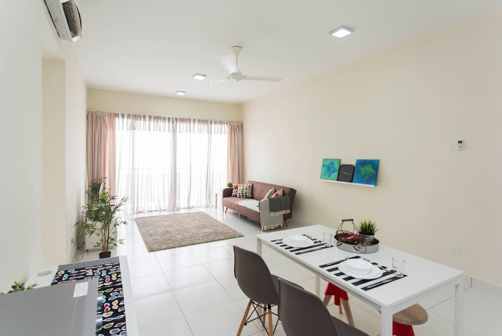 Spacious living and dining area with abundance of natural daylight