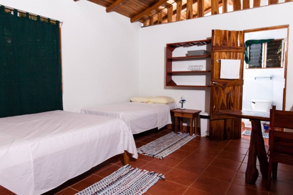 A matrimonial and a single bed. (Some units have a bunk instead of the single.)