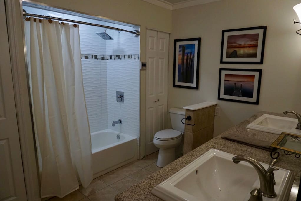 Large double sink bathroom with new tile