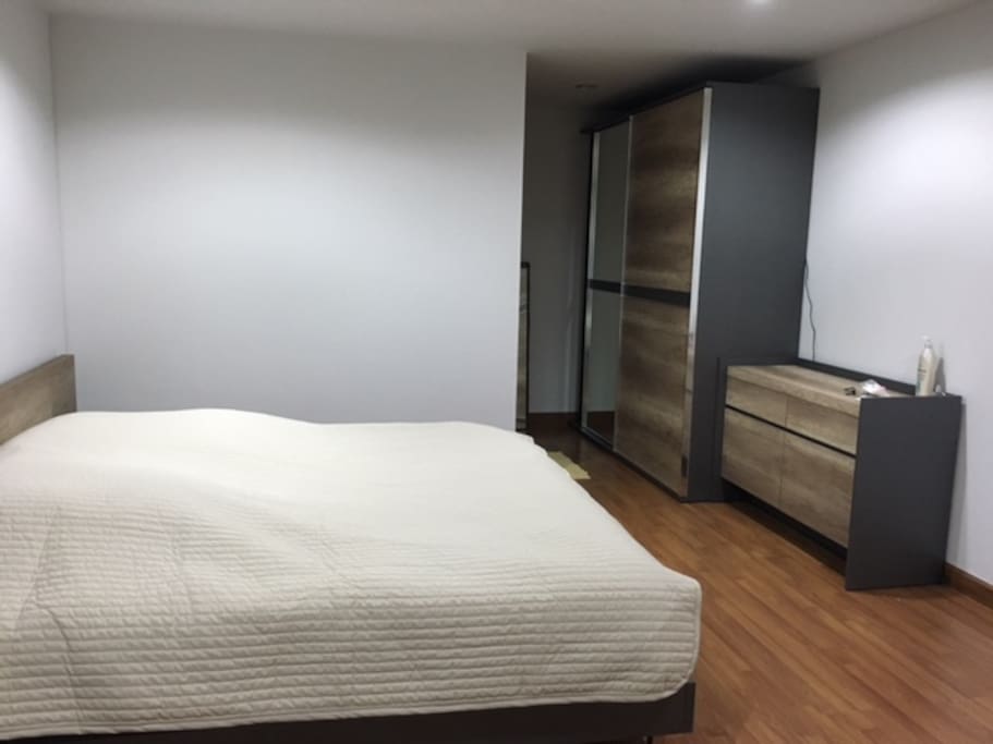 King Size bed with Wardrobe and all amenities