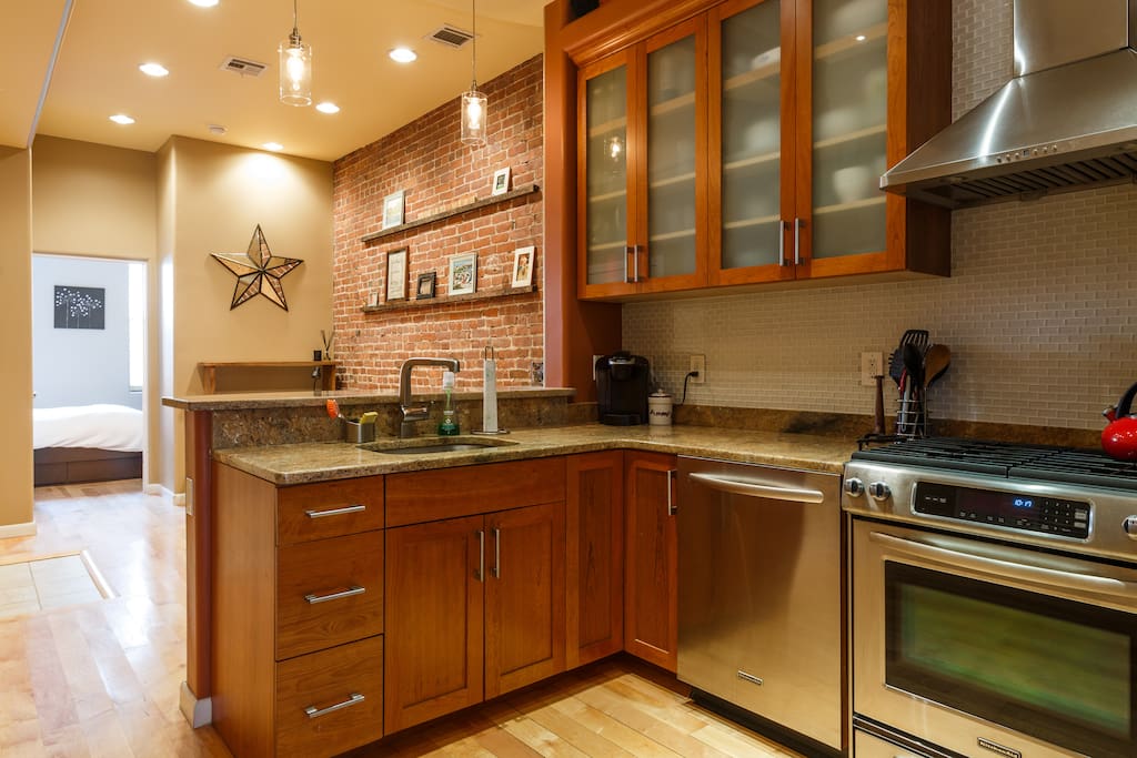 Kitchen with breakfast bar and dining area