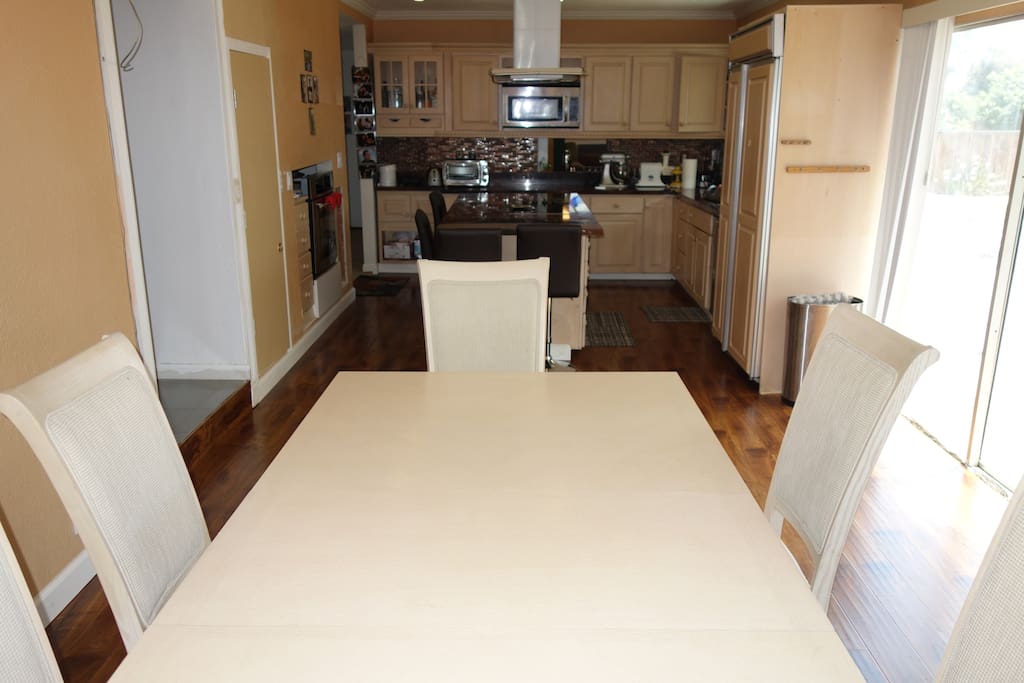 New granite kitchen with large dining table