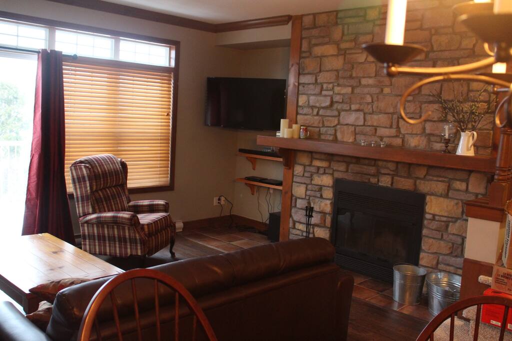 View this stunning wood burning fireplace as you sip your wine