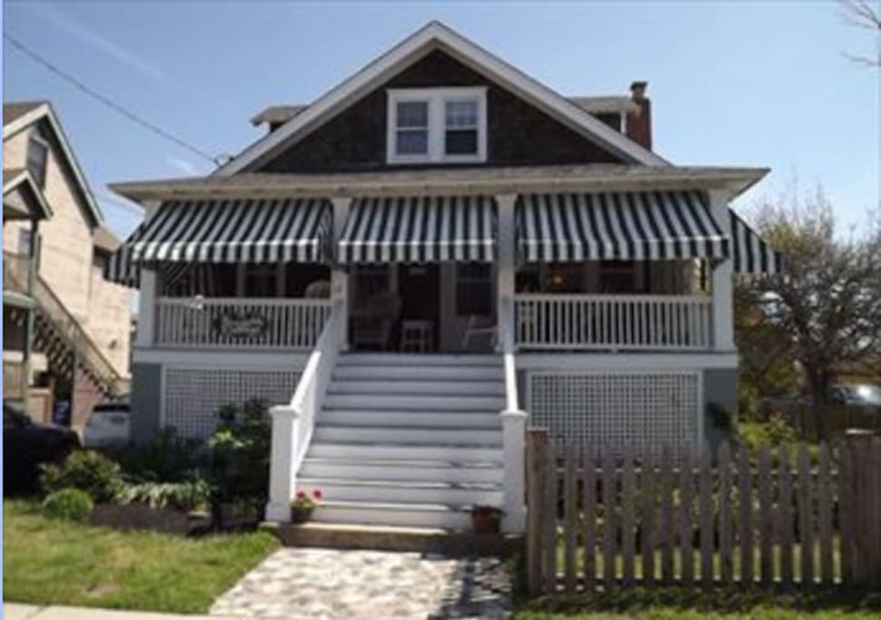 Sitting on the front porch, you will enjoy see the Cape May beach and a row of historic Victorian houses (Stockton cottages)