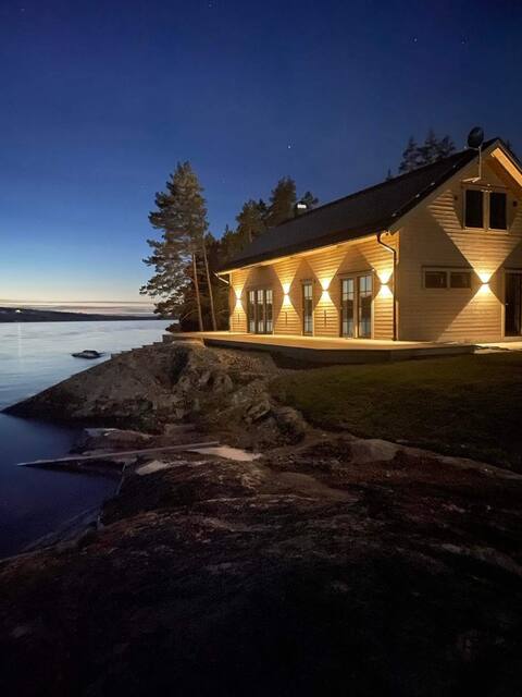 Uvamoen a unique house with lake property and its own beach.