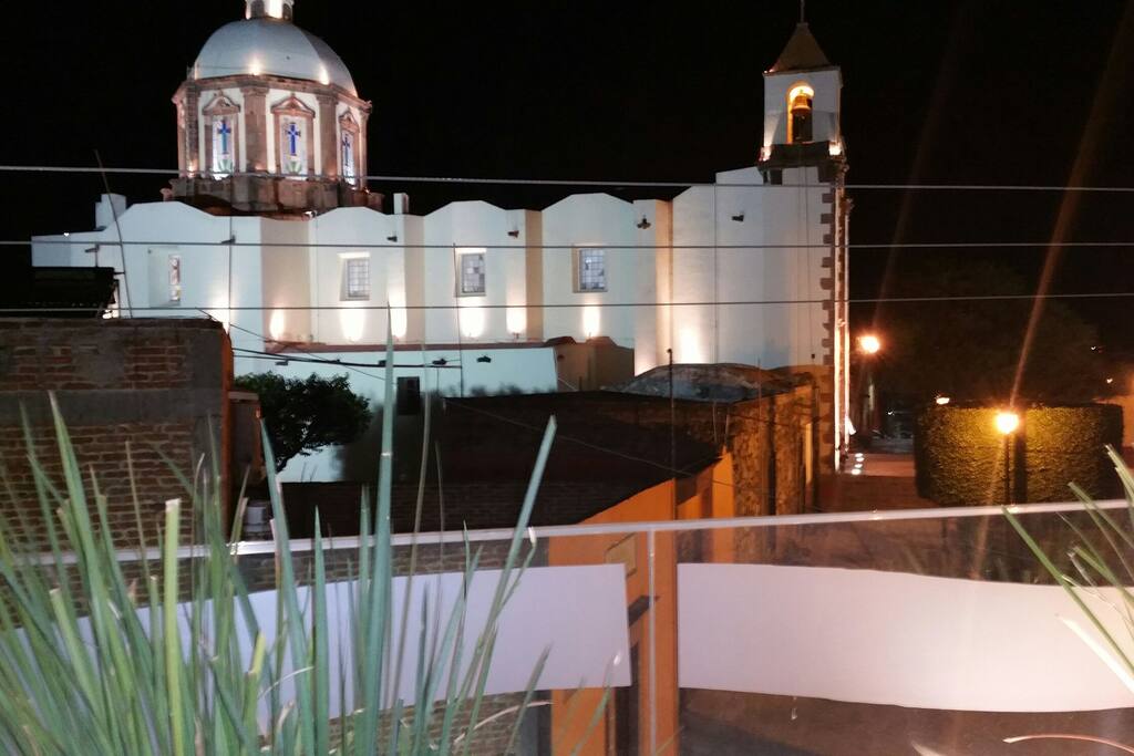 Night view of San Antonio Church across the street.