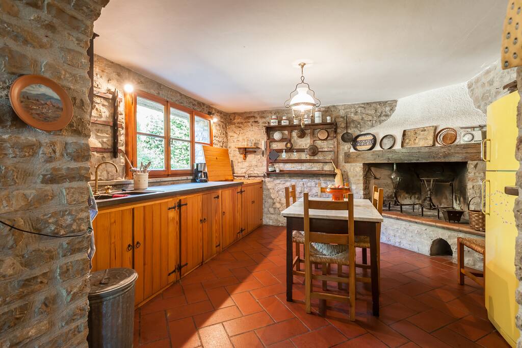 THE KITCHEN WITH FIREPLACE