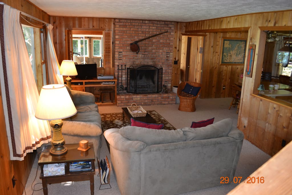 Open concept living area with lake views